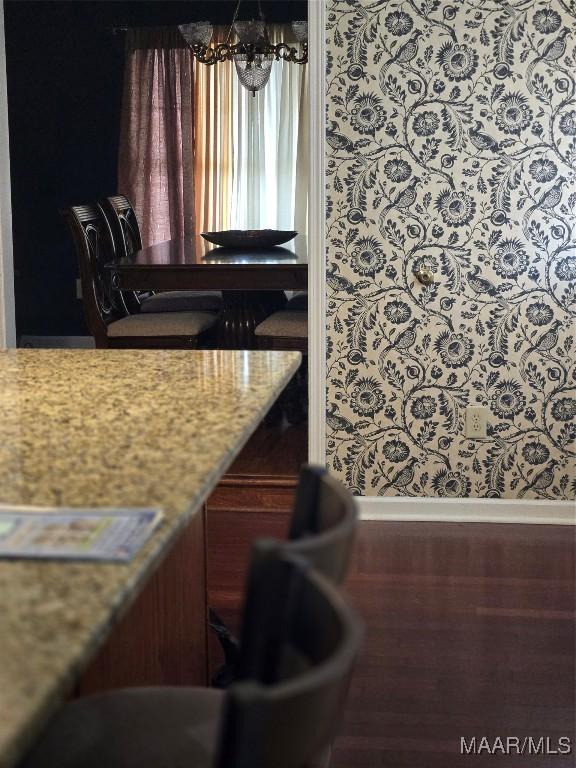 dining area featuring an inviting chandelier