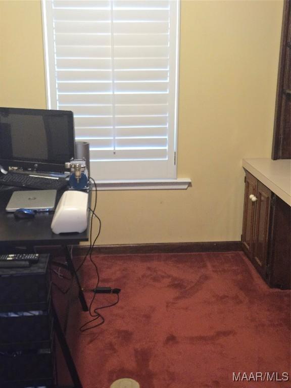 view of carpeted home office