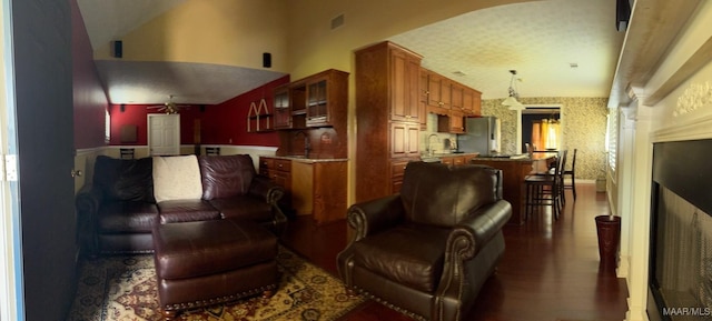 3601 Richardson Rd S, Hope Hull, AL 36043 - living room with ceiling fan, wood finished floors, wallpapered walls, and high vaulted ceiling