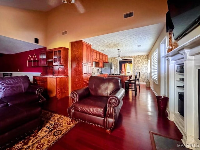 3601 Richardson Rd S, Hope Hull, AL 36043 - living room featuring wallpapered walls and dark wood-type flooring
