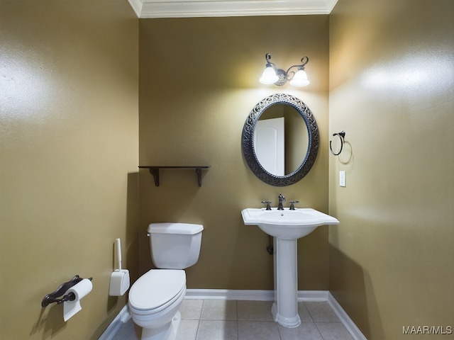 bathroom with tile patterned flooring and toilet