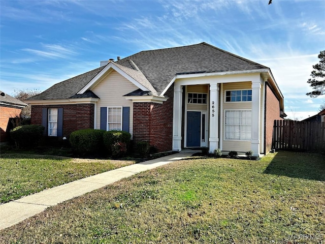 view of front of property with a front lawn