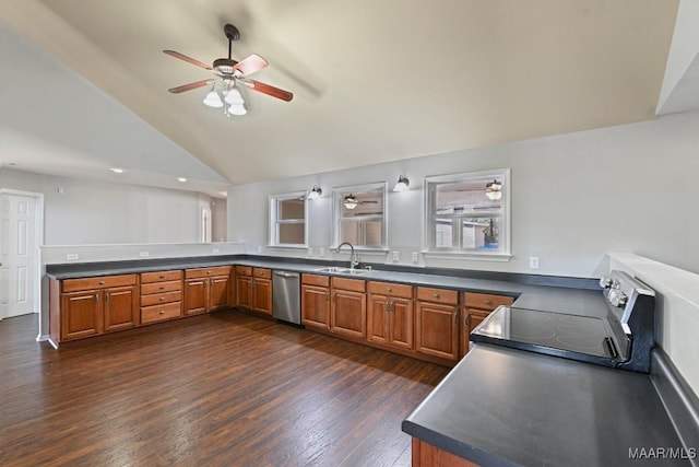 kitchen featuring dishwasher, stove, sink, dark wood-type flooring, and vaulted ceiling