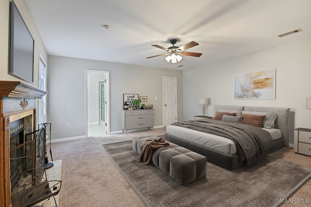 bedroom featuring ceiling fan and carpet flooring