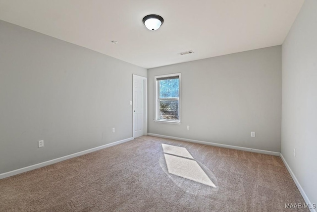 empty room with carpet floors