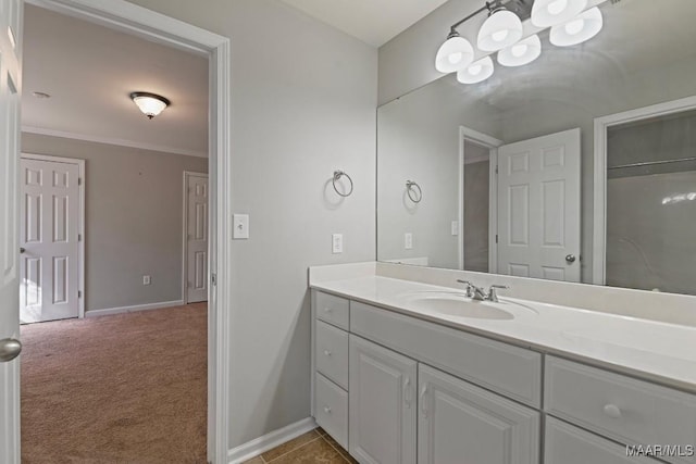 bathroom featuring vanity and crown molding