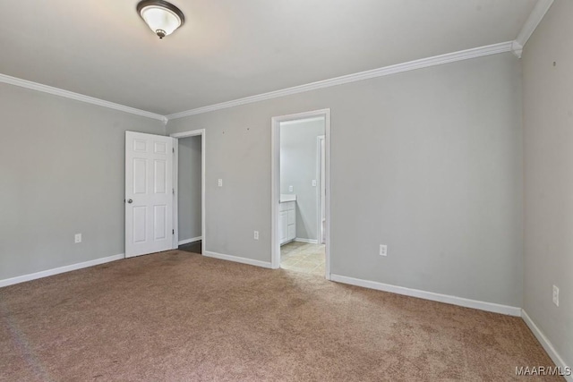 carpeted spare room with crown molding