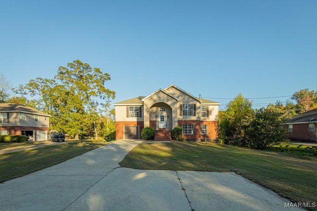 view of front facade featuring a garage and a front lawn