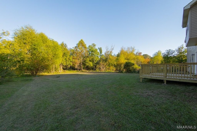 view of yard with a deck