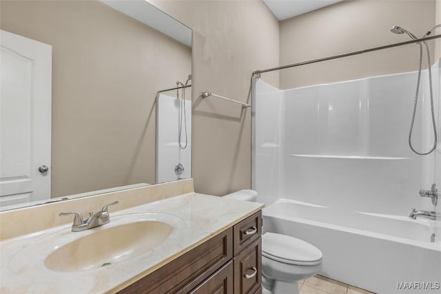 full bathroom with vanity, toilet, tile patterned floors, and shower / bathing tub combination