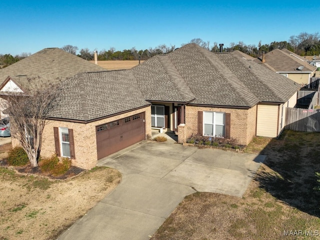 single story home featuring a garage