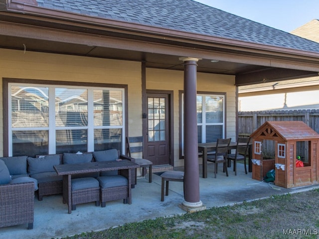 view of patio featuring a shed