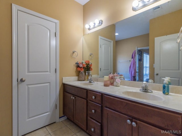 bathroom featuring vanity and tile patterned flooring