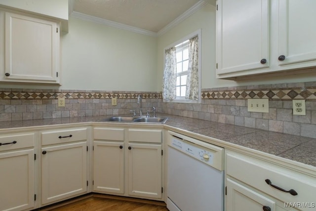 kitchen featuring dishwasher, sink, white cabinets, and ornamental molding