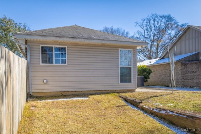 view of home's exterior featuring a yard