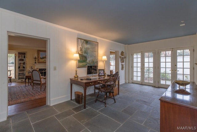 home office with french doors and crown molding