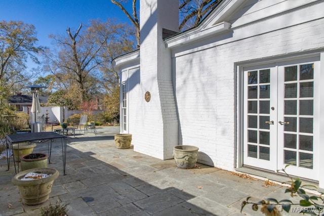 view of patio featuring french doors