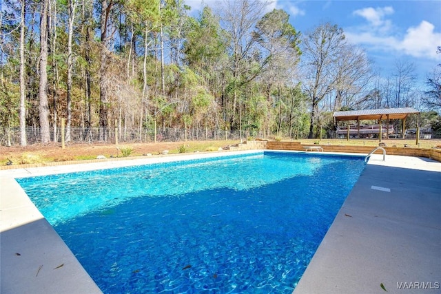 view of swimming pool featuring a gazebo