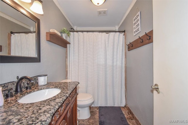 bathroom featuring vanity, curtained shower, ornamental molding, and toilet