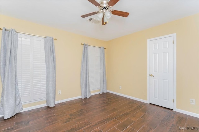 spare room with ceiling fan