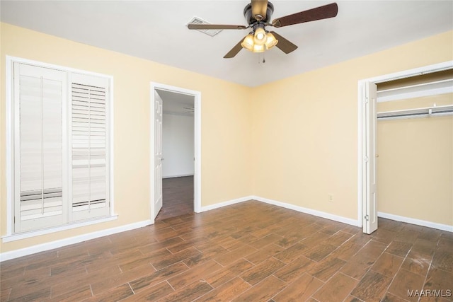 unfurnished bedroom featuring ceiling fan