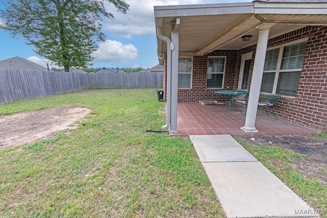 view of yard with a patio area