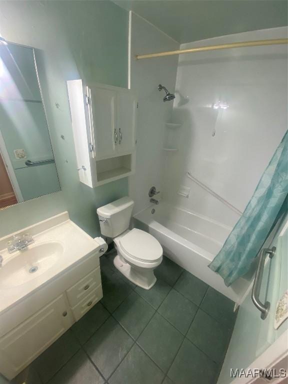 full bathroom featuring shower / bathtub combination with curtain, vanity, tile patterned flooring, and toilet