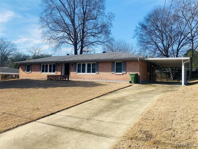 ranch-style home with a carport