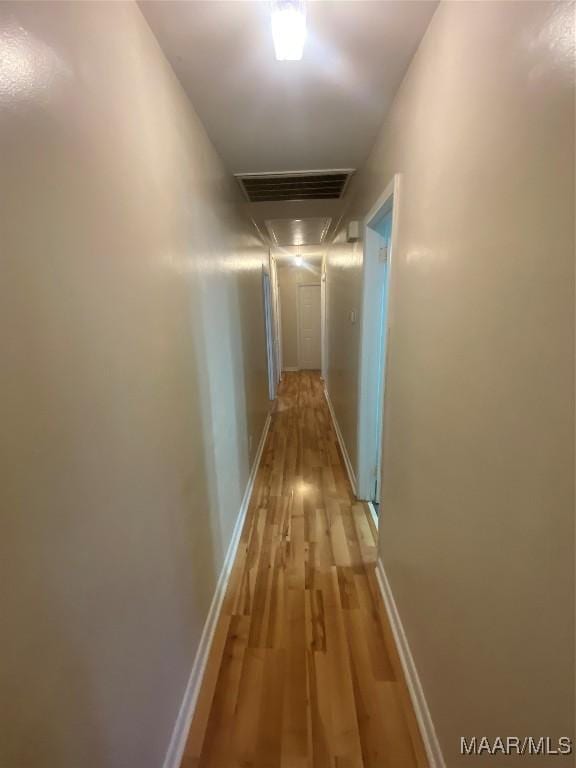 hallway featuring light wood-type flooring