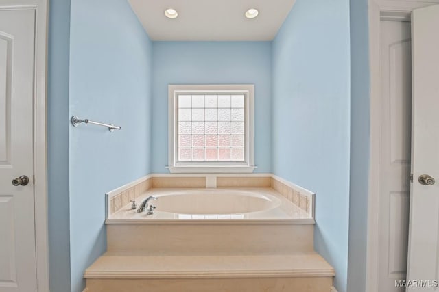 bathroom with a bathing tub