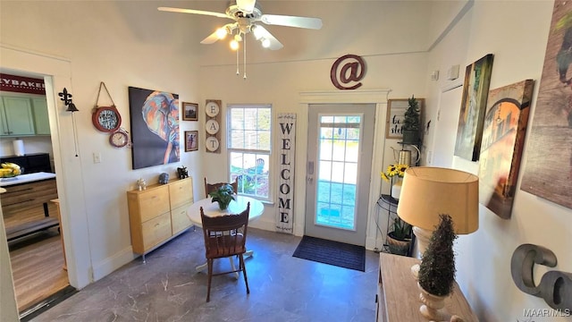 foyer featuring ceiling fan