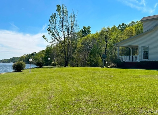 view of yard with a water view