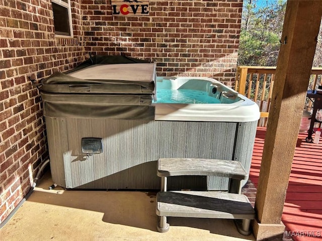 exterior space featuring a hot tub