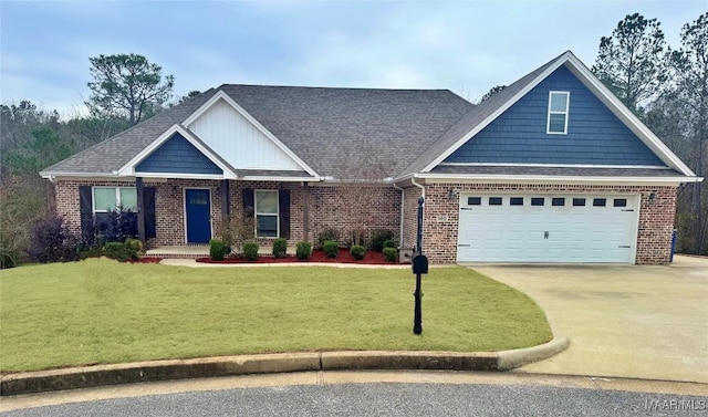 craftsman inspired home with a garage and a front yard