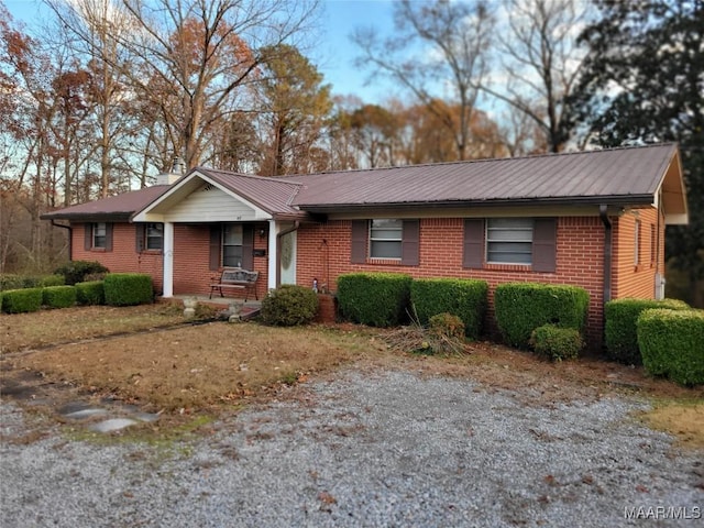 ranch-style home with covered porch