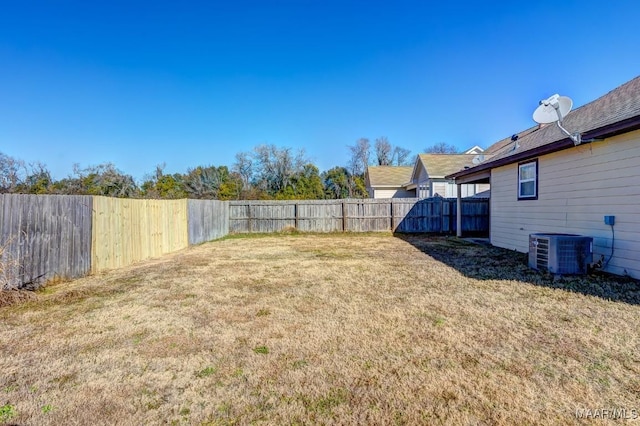 view of yard featuring central AC unit