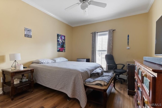 bedroom with crown molding, dark hardwood / wood-style floors, and ceiling fan