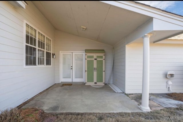 property entrance with a patio