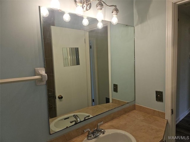 bathroom with tile patterned floors and vanity