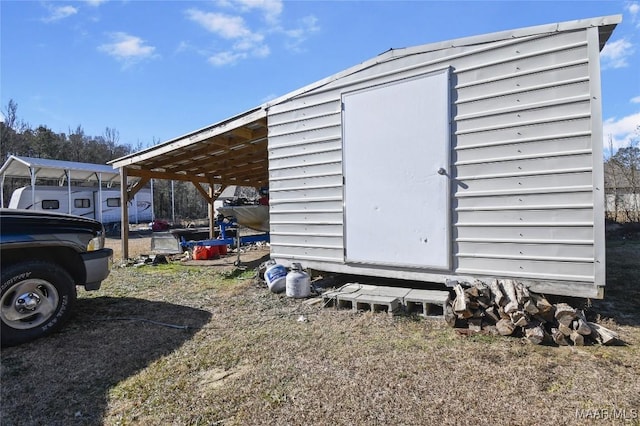 view of outdoor structure featuring a carport