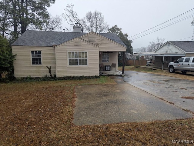 exterior space featuring a carport