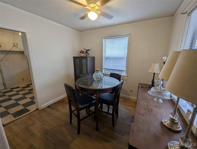 dining area featuring crown molding, ceiling fan, and dark hardwood / wood-style floors