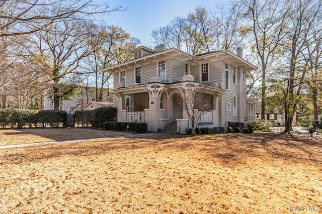 italianate-style house featuring a porch and central air condition unit