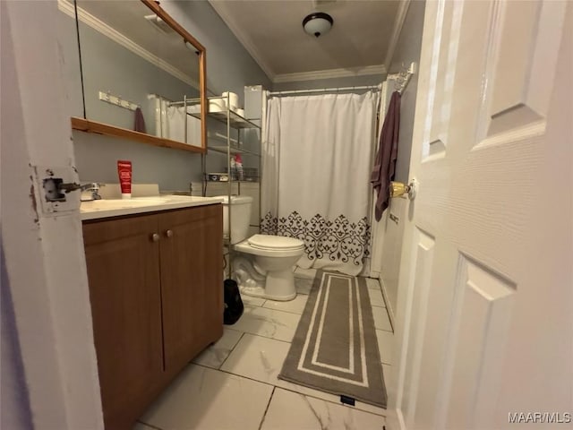 bathroom with crown molding, vanity, and toilet