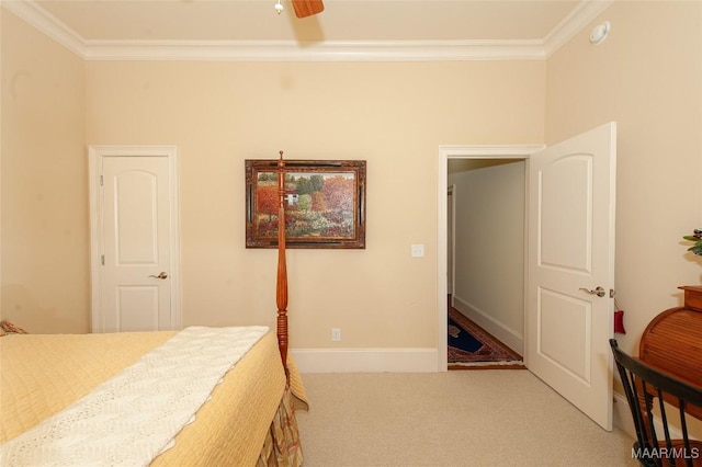 carpeted bedroom with crown molding and ceiling fan