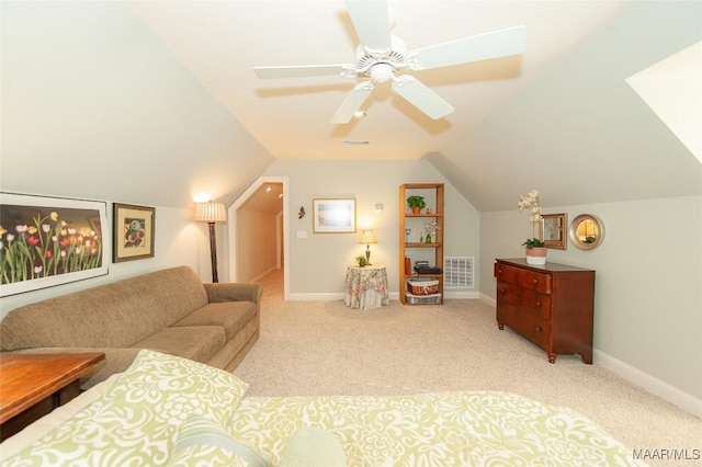 bedroom featuring ceiling fan, lofted ceiling, and light carpet