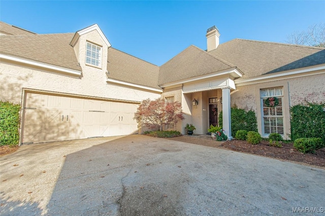 view of front of property featuring a garage