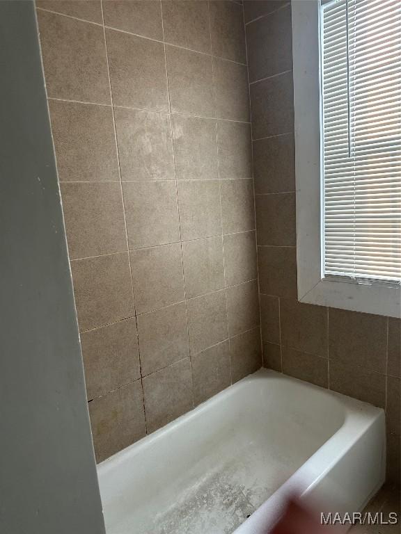 bathroom featuring a bathing tub