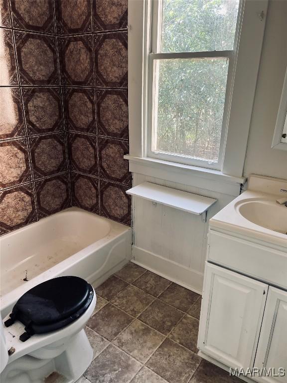 full bathroom with vanity, shower / bathing tub combination, and toilet