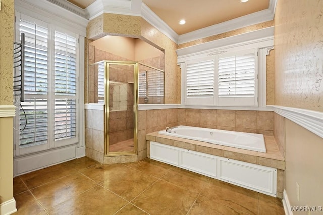full bath featuring a shower stall, tile patterned floors, a healthy amount of sunlight, a bath, and crown molding